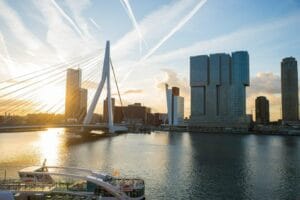 Rotterdam cityscape with Erasmus Bridge and modern buildings—study business in the Netherlands for top-ranked universities and global career opportunities.
